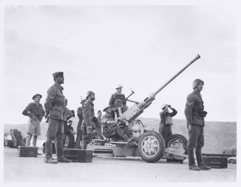 Greek and British soldiers man an anti-aircraft gun, 1941