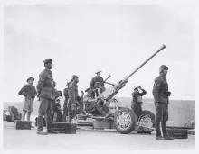 Greek and British soldiers man an anti-aircraft gun, 1941